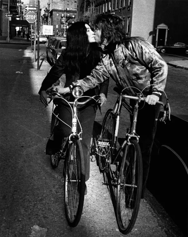 John Lennon and Yoko Ono on bicycles