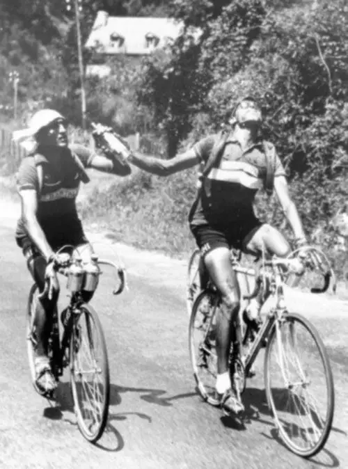 The famous bottle photo of Coppi and Bartali: Fausto Coppi and Gino Bartali sharing a bottle at Tour de France 1952