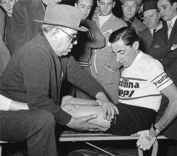 Fausto Coppi gets the treatment from his blind soigneur, Biagio Cavanna