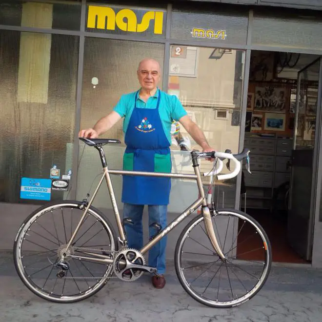 Boutique bicycle manufacturers: Alberto Masi in front of his bike shop in Milano