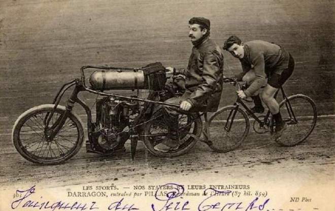 Louis Darragon behind a motorbike
