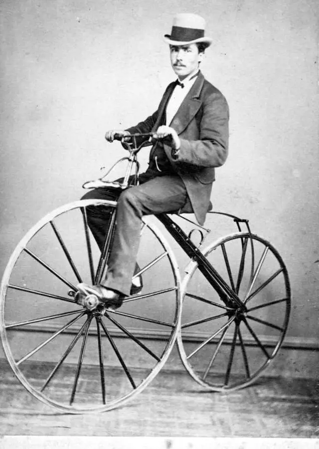 Riding and balancing a bicycle - Man on a velocipede