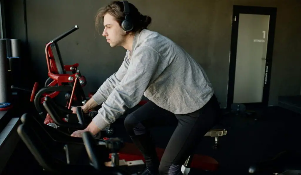 Cannot go outside - Man training on an exercise -bike