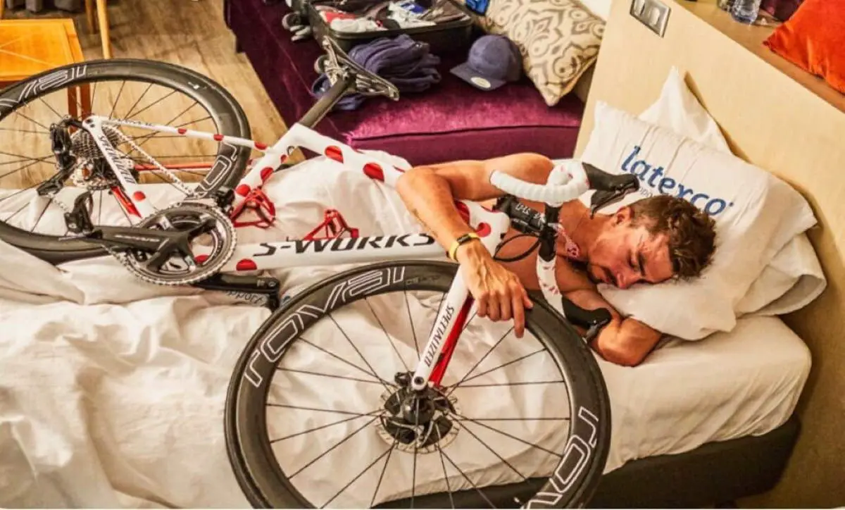 Julian Alaphilippe sleeps with bicycle