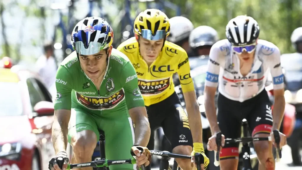 Wout van Aert, Jonas Vingegaard, and Tadej-Pogacar during the Tour de France 2022. Wout van Aert exemplifies the puncheur domestique, blending explosive power and tactical skill to support his GC leaders like Jonas Vingegaard.