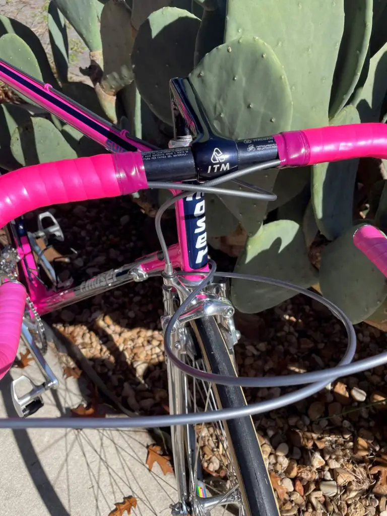 Restoration of Mauro-Antonio Santaromita's 1990 Chateau d'Ax-Salotti Race Bike: Black anodized ITM ITALMANUBRI 42 c-c handlebar and Ambrosio Moser Violet-Pink Fade, pattern F56 handlebar tape